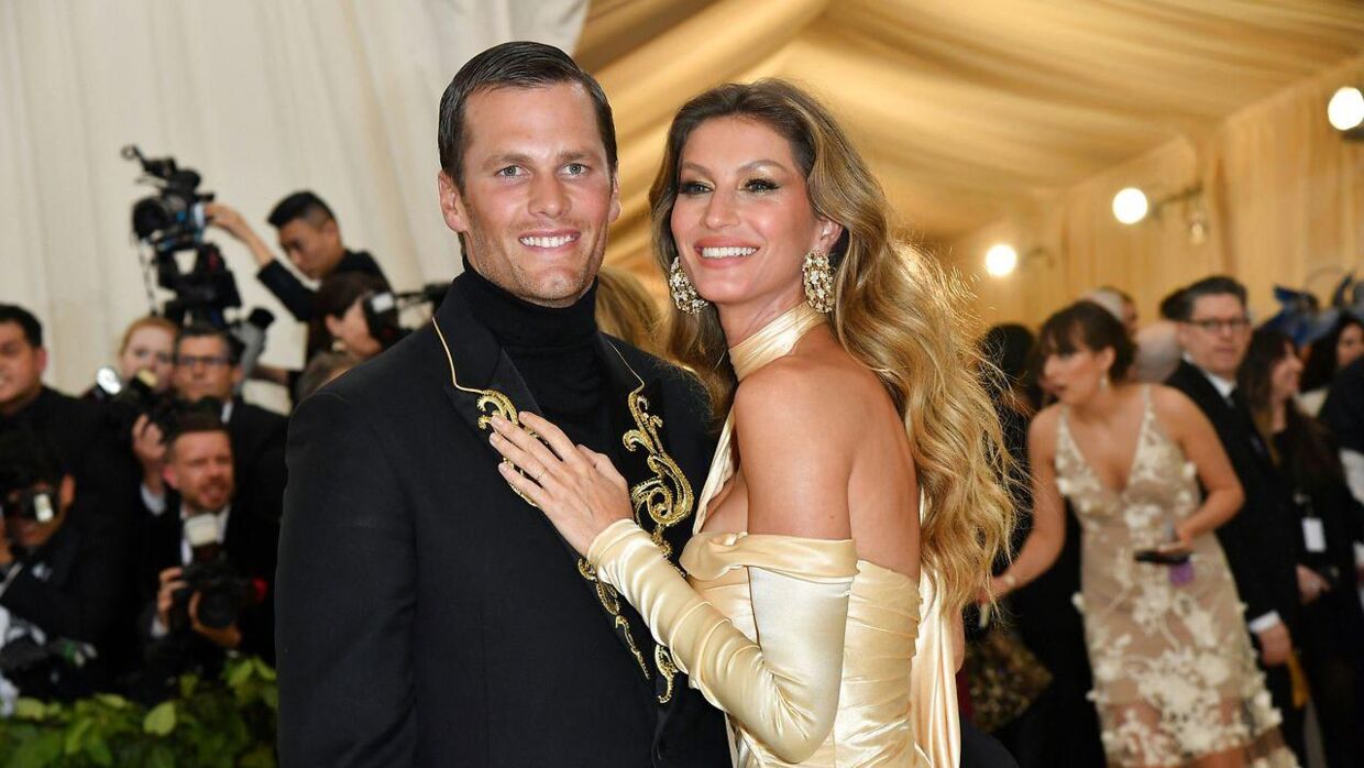 Her ses Tom Brady med hustruen Gisele Bündchen, der er en af verdens kendte supermodeller.