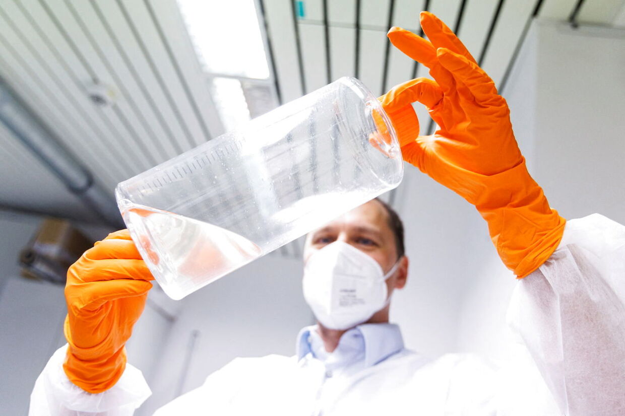 An employee of the vaccine company Bavarian Nordic shows a container with fibroblast cells from chicken embryos for the propagation of vaccine viruses in a laboratory of the company in Martinsried near Munich, Germany, May 24, 2022. The company, headquartered in Denmark, is the only one in the world to have approval for a smallpox vaccine called Jynneos in the U.S. and Imvanex in Europe, which is also effective against monkeypox. REUTERS/Lukas Barth?